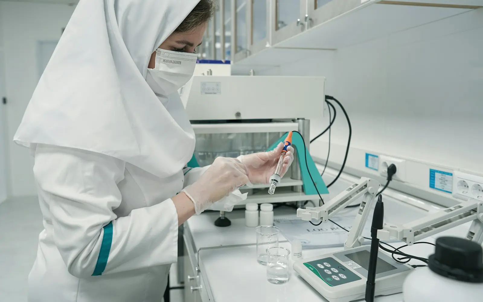 A scientist testing samples in a quality control laboratory
